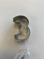 3 - Tre tal metal udstikker 4,0 x 2,5 cm.