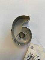 6 - Six (and 9 - Nine) metal cutter 4,0 x 2,5 cm.